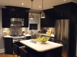 You will also learn reliability by brand and product type based on 35,256 service calls logged by our service department just last year. Modern Black And White Kitchen With Stainless Steel Appliances Hgtv