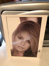Hope it's ok to post this. Some creativity is in the books for today.  Bought this signed glossy still of Cindy Crawford over 23 years ago in  England at a movie fair.