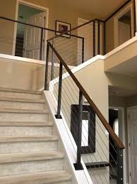 Additionally, oak treads and flooring are commonly used to complete the look. Adalia Cable Railing Modern Cable Railing System With Painted Steel Posts And Stainless Steel Cables And Wood Cable Railing Modern Stairs Cable Stair Railing