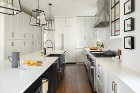 black apron sink in black kitchen