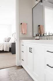 Then go with a bronze chandelier and bronze sconces. you can mix metals, says jennifer markanich, owner and designer of timeless interiors. New Construction Modern Farmhouse Design Black Bathroom Black Bathroom Hardware Bathroom Hardware