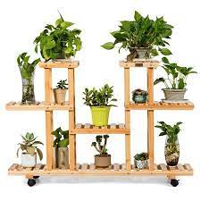Costway 4 Tier Wooden Plant Stand W Wheels Multipurpose Storage Rack Wood Grain Color Walmart Com In 2021 Wooden Plant Stands Plant Stand Wood Plant Stand