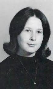 Officials: Body found in lake buried twice