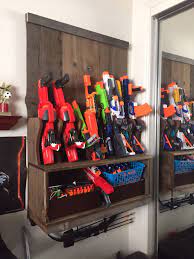 After pondering all these problems for way too long, i decided to make this nerf storage rack out of pvc pipe with hooks to hang all the toys. Pin On Nerf