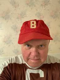 Yesterday a neighbor gave me this magazine and several more from the  1940's. This Norman Rockwell cover is the Cubs dugout at Braves Field in  Boston. You can see a Braves hat