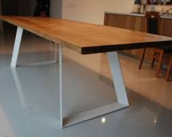 Our solid timber dining tables are made from quality oak & walnut timber in a range of versatile round & square designs. Etsy Summer Sale Red Oak Dining Table Live Edge Slab Oak Top On Steel Legs Solid Oak Dining Table Oak Dining Table Steel Dining Table