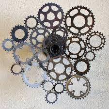 Recycled Bicycle Sprocket Wall Sculpture Spins 360 Degrees Etsy Wall Sculptures Space Wall Art Recycle Sculpture