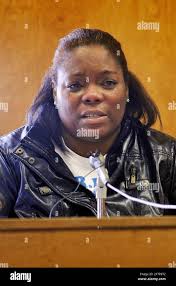 Yolanda Cherry sheds tears as she testifies that she tried to protect her  nephew Jamar Pinkney, Jr. as he was being beaten by his father Jamar  Pinkney, Sr. shortly before Pinkney Sr.