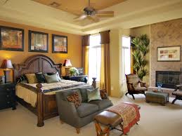 28 beautiful bedroom fireplaces architectural digest. Contemporary Yellow Master Bedroom With Fireplace Sitting Area Hgtv