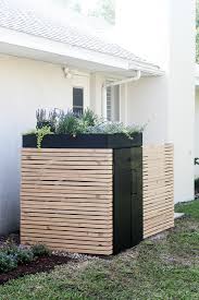 When autocomplete results are available use up and down arrows to review and enter to select. Diy Modern Ac Unit Cover And Trash Can Storage Within The Grove