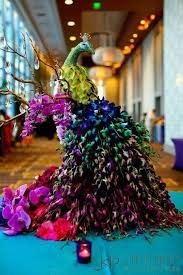 Cut out by hand, the burgundy peacock's feathers form a circular composition around its head. Oh So Fancy Peacock Decor Ideas To Prettify Your Wedding Shaadisaga