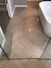 Tempo White Lapatto 300x600 Laid In A Herringbone Design To Add Some Magic To A Bathroom Floor Bathroom Floor Tile Patterns Tile Floor Patterned Floor Tiles