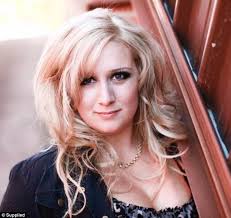 Gemma Louise Kirby is a singing mining truck driver who dropped 54 kilos