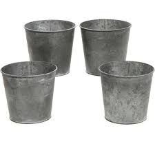 Not only does this look great and rustic, the wagon lifts the planter adding interesting depth to the outdoor space. Set Of 4 Small Galvanized Buckets Walmart Com Walmart Com