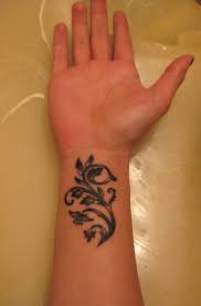 Small floral design tattoos on wrist: Inner Wrist Tattoos Pictures