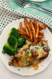 Spread chicken breast with honey mustard, cover with a layer of mushrooms, three pieces of bacon and then sprinkle with shredded. Grilled Chicken Topped With Bacon Mushrooms And Cheese