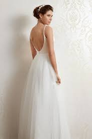 The lace goes over a reversible slip, so you can change. Wedding Dress Lace Overlay Before And After Heili Bridal