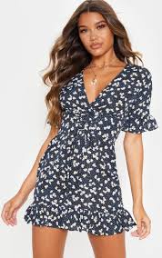 5 out of 5 stars. Navy Ditsy Floral Print Corset Swing Dress Prettylittlething