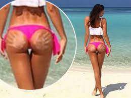 Cheeky! Irina Shayk shows off two hand prints on bare bum in holiday  paradise - Mirror Online