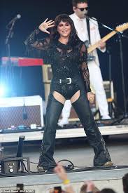 newly brunette kesha dons black leather chaps to perform at