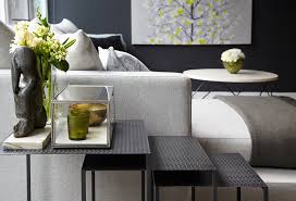 This table is made of metal. Chic Stackable Nesting Tables To Save Space In Style