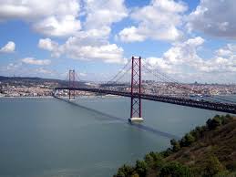 The 25 de abril bridge (ponte 25 de abril) is europe's longest suspension bridge. Ponte 25 De Abril Portugal Travel Guide Photos