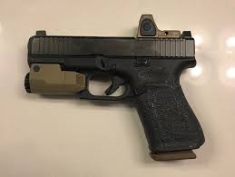 The cut out, at least for me, is a non issue. Glock 19 Help Me Choose The Right Glock 19 Glock Forum Glocktalk