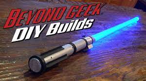Odin Shows Brittni How To Make A Combat Ready Lightsaber Brittni Barger Beyond Geek Host Odin Abbott Odin Make Diy Lightsaber Star Wars Light Saber Geek Diy