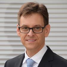 Optical Fused Silica Large-Core Fibers: The Influence of Design and  Material