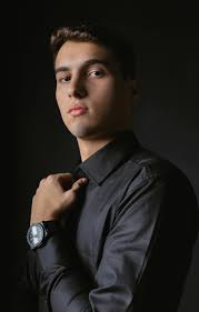 Young Adult Male Looking Up in Studio Portrait · Free Stock Photo