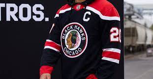 The home jersey was red and the away jersey was white. Chicago Blackhawks Reveal Black 1940s Inspired Reverse Retro Jersey Second City Hockey