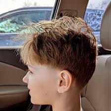 My son has very long hair and he's finally considering cutting it, but he  doesn't want just a buzz cut. He's thinking of keeping some length and  having a more trendy teen