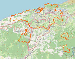 Are there cities, like Tripoli, Lebanon, where the city is divided into two  isolated parts but are still considered as one city?