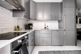 Get free kitchen design estimate by visiting a store near you. Monochrome Kitchen With Gray Cabinets And Brass Hardware Buster Punch
