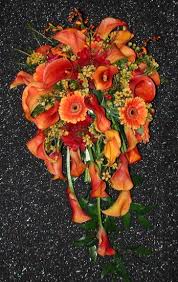 Dorothy met us at the venue, and she made my wedding day so special by designing and making a beautiful cascading bouquet of flowers i had initially told her i liked in our nearly 3 hour meeting where we selected and discussed everything from flower choices and centerpieces to invitations and tablecloth colors. A Mango Callas Orange Gerberas Brides Bouquet Mango Callas Orange Gerbera Bride S Bouquet Cascade Bridal Bouquet Style Mango Callas And Gerbera Daisy Bouquet Mango Callas Orange Gerbera Bri It S Free