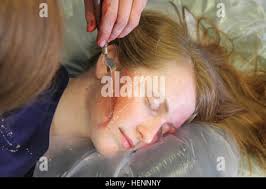 Missouri-Kansas City guard Moses Howard, front, scrambles to retrieve a  loose ball as Colorado guard Antoine McGee comes in to cover in the first  half in Boulder, Colo., Tuesday, Dec. 21, 2004. (