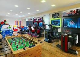 Kids Game Room Video Game Room For The Kids Brown Wooden Floor Design Large Kids Room Design Ideas Game Room Games F Video Game Rooms Video Game Room Game Room