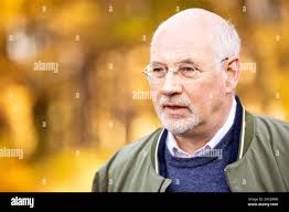 Bergen, Germany. 25th Oct, 2021. Thomas Rahe, Scientific Director and  Deputy Director of the Bergen-Belsen Memorial, gives an interview to a  television team