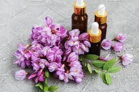 Essential Oils And Pink Acacia Flowe Essential Oils Oils Pink