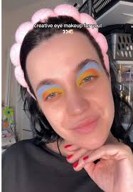 A truly creative eye makeup look that will catch everyone's  attention!💙🧡💛#recommendations #creative #eyemakeup #idea  #makeuptutorials #fyp #tutorial #makeup #makeup #eyes #makeuptiktok