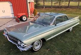 Image result for Platinum Gray 1961 Cadillac