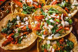 A generous portion of grilled fresh fish is laid atop pillowy flour tortillas garnished with lime cabbage slaw, and poblano lime tartar sauce. Best Tacos In New York City