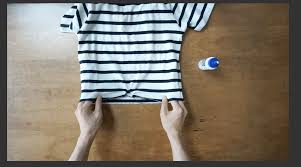 With a pair of fabric scissors, cut the shirt to your desired length. No Sew Crop Top From T Shirt Fashion Wanderer