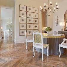 A finely set dining room table with china and crystal creates the mood for an elegant dining experience with friends, family, or business associates. Framed Sea Art Dining Room Gallery Wall Design Ideas