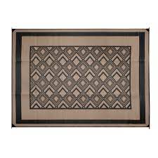 While it covers 9' by 12' when unrolled, it rolls up into a light weight, tight package and stows away in a convenient storage bag that comes with it. Reversible Geometric Design Rv Patio Mat 9 X 12 Camping World