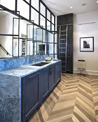 This smaller kitchen expertly makes use of the space. Contemporary Kitchen With Glass And Steel Wall Joel Kelly Design Hgtv