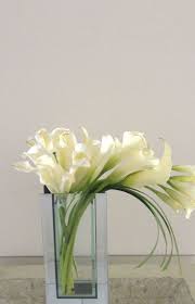 Maybe you would like to learn more about one of these? Send Lily In Harmony In West Palm Beach Fl From Burst Of Class Florist T Home Flower Arrangements Contemporary Flower Arrangements Modern Flower Arrangements