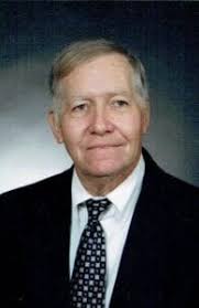 Obituary and funeral service details for former Airport Coach Les Evans