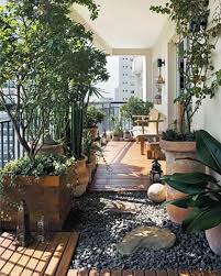 Team with planters in similar citrus tones to bring the entire space to life. Balcony Garden Ideas To Create A Unique Outdoor Space Milestone