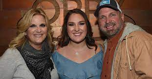 Maybe you would like to learn more about one of these? Garth Brooks Spends His Birthday With His Daughters And Granddaughters Rare Country